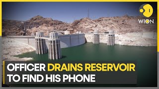 Officer in India drops phone while taking selfie drains reservoir to find it probe on  WION [upl. by Ocramed]