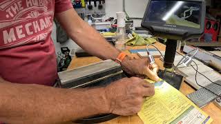 Kyle in his Knife shop and sharpening kitchen knives [upl. by Namurt]