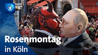 Kölner Rosenmontagszug greift Weltpolitik satirisch auf [upl. by Magnus]