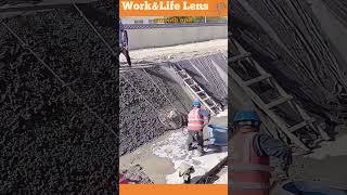 Workers use power trowels to finish a concrete canal ensuring strength and smoothness for water flow [upl. by Culberson]