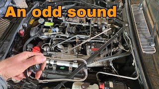 Identifying an Odd Sound on this Jaguar V12 [upl. by Fujio]