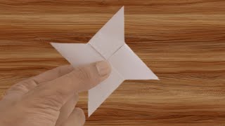 How to make a Ninja Star shurikenOrigami paper [upl. by Anaira625]