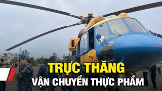 Trực thăng vận chuyển thực phẩm cho bà con vùng lũ  VTV1 [upl. by Sherlocke]