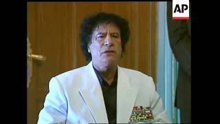 Gadhafi arrives walks out of opening session comments [upl. by Yanat1]