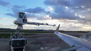 How flights DeICE Deicing an airplane at Heathrow [upl. by Arraeis]