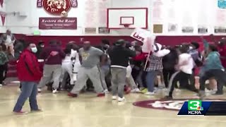 High school basketball game in Sacramento ends in controversy as fans rush the court [upl. by Assirt]