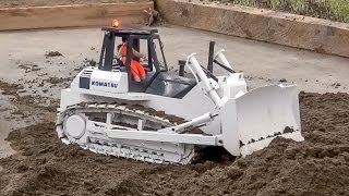 RC Dozer Action Amazing detailed Caterpillar amp Komatsu RC machines [upl. by Lampert15]