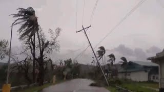 Typhoon Manyi sends hundreds of thousands fleeing in the Philippines [upl. by Romanas]