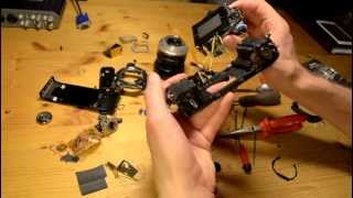 Minolta X300 SLR camera Disassembly [upl. by Romano]