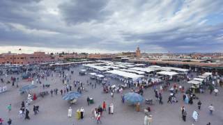 Timelapse from day to night with clouds looking over Djemaa elFna market Marrakech Morocco [upl. by Sanger]