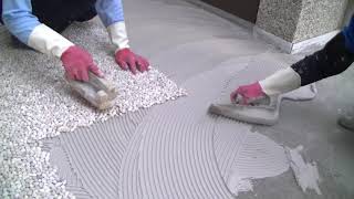 Pebble tile installation process on floor [upl. by Aicatan]