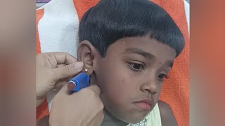 piercing my own ear at home with a disposable piercing gun diy high earlobe piercing [upl. by Akirdnahs622]