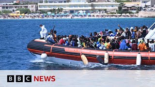 Lampedusa 7000 migrants arrive on Italian island in three days  BBC News [upl. by Dugald]