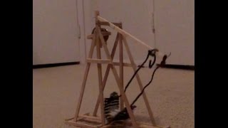 Catapult made from used Starbucks coffee stirrers [upl. by Lyckman]