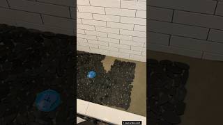 Install a pebble shower floor diy tiling howto tile construction riverrock pebbles [upl. by Yntruoc]