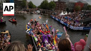 WATCH Annual Pride canal boat parade in Amsterdam [upl. by Adala]