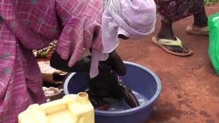 Little Christianar Baby Brendah gets a bath at hospital in JinjaUganda Africa [upl. by Rozalie]