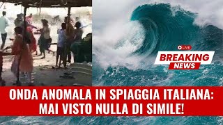 😱😱 Onda anomala travolge la spiaggia italiana bagnanti increduli guard [upl. by Yelsnya]