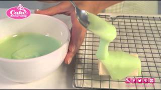 Pouring Fondant icing on a sponge finger [upl. by Ohaus]