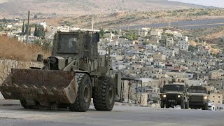 Israeli army vehicles deploy in West Bank camp after deadly raid  AFP [upl. by Ttesil769]