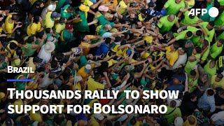 Thousands rally in Sao Paulo to show support for expresident Bolsonaro  AFP [upl. by Retseh]