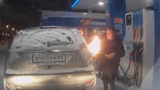 Woman sparks fire trying to unfreeze gas pump with lighter [upl. by Hawken]