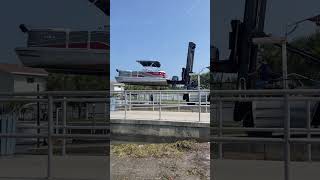 Fork Lift a Pontoon Boat boating forklift machine south mermaid peace ocean boat florida [upl. by Ricketts]