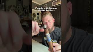 Cigar 101 Cutting your cigar with a scissor cutter [upl. by Ahsemit]