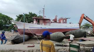 Part 2 undocking of steel light boat ⛵ using backhoe and airbags [upl. by Cornie]