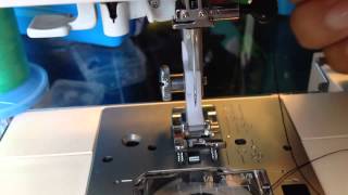 Threading A Sewing Machine Needle With Automatic Threaders [upl. by Demahom504]