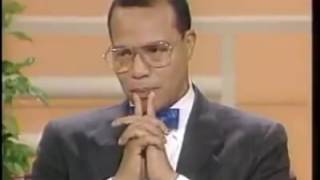 Minister Louis Farrakhan handles the Donahue [upl. by Eylrac]