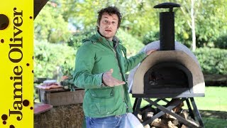 Jamie Oliver shows you how to cook pizza in a wood fired oven [upl. by Scrivings304]