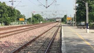 12204 AmritsarSaharsa Garib Rath Express Crossing Nilokheri Station At Full Speed [upl. by Enerahs]