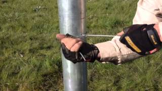 Tying wire to Strainer Post [upl. by Tingey]