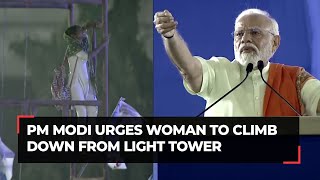 Viral video PM Modi urges woman to climb down from electric tower during his rally in Hyderabad [upl. by Ramonda16]