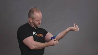 Application of KT Tape to treat Golfers Elbow [upl. by Ardnoyek]