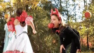 Halloween Party Games Stay Dry Apple Bobbing  Southern Living [upl. by Hafeetal]