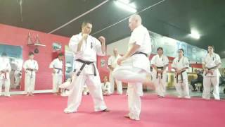 Garry ONeill Kyokushin Karate demonstrates roundhouse kick and body weight shifting with Dean Booth [upl. by Lundquist918]