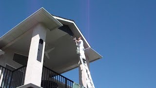 Painting Stucco Houses Solo  Spray and Back Roll Techniques [upl. by Banquer461]