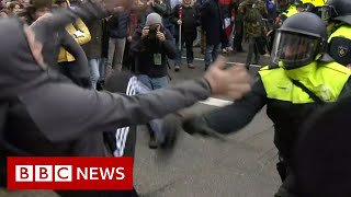 At least 30 arrested during Amsterdam unauthorised lockdown and vaccination protest  BBC News [upl. by Yboj526]