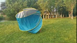 How to fold up a pop up beach tent [upl. by Milon169]