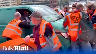 Van driver ploughs through Just Stop Oil protesters in London [upl. by Lorou]