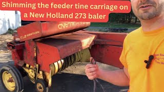 Shimming the feeder tine carriage on a New Holland 273 baler [upl. by Eirojam]