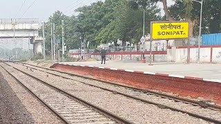 12926 Paschim Express departing Sonipat and 12716 Sachkhand Skipping at speed with LDH WAP7 30828 [upl. by Eloise]