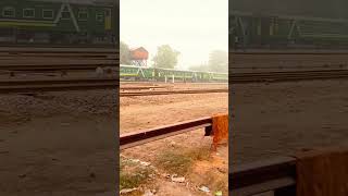 5UP Green line passing through Chichawatni station at high speed greenline railwaybridgetravel [upl. by Odrareg]