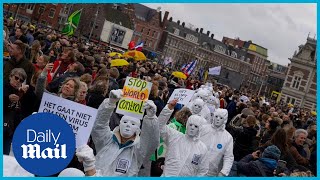 Antilockdown protesters take to the streets of Amsterdam defying ban [upl. by Hatfield]