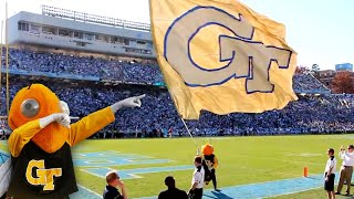 Georgia Techs mascot Buzz celebrates a touchdown with the school flag in the end zone at UNC [upl. by Enelrahc475]