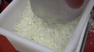 Onion chunks 64mm slicing on the Urschel® Model E TranSlicer® Cutter [upl. by Innoc811]