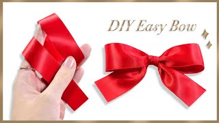 How to tie the perfect bow  DIY ribbon bow  How to make simple satin bow  Gift Wrapping Land [upl. by Aimek]