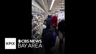 Smash and grab Group of thieves ransack Walgreens store at San Franciscos Civic Center area [upl. by Sairtemed]